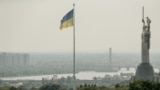 UKRAINE DAILY LIFE --ThenUkrainian national flag flies next to the Motherland Monument (R) in Kyiv (Kiev), Ukraine, 25 July 2023.