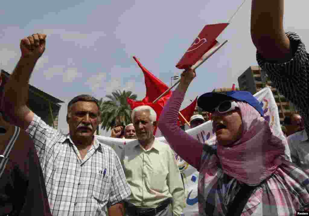 İraq, Bağdad. Kommunist Partiyasının ke&ccedil;irdiyi mitinq. 1 may 2013