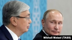 Kasım-Jomart Tokayev və Vladimir Putin