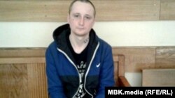 Михаил Цакунов задержан в Петербурге за участие в акции "Он нам не царь" 5 мая 2018