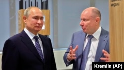 Потанин (справа) с Владимиром Путиным, 2019